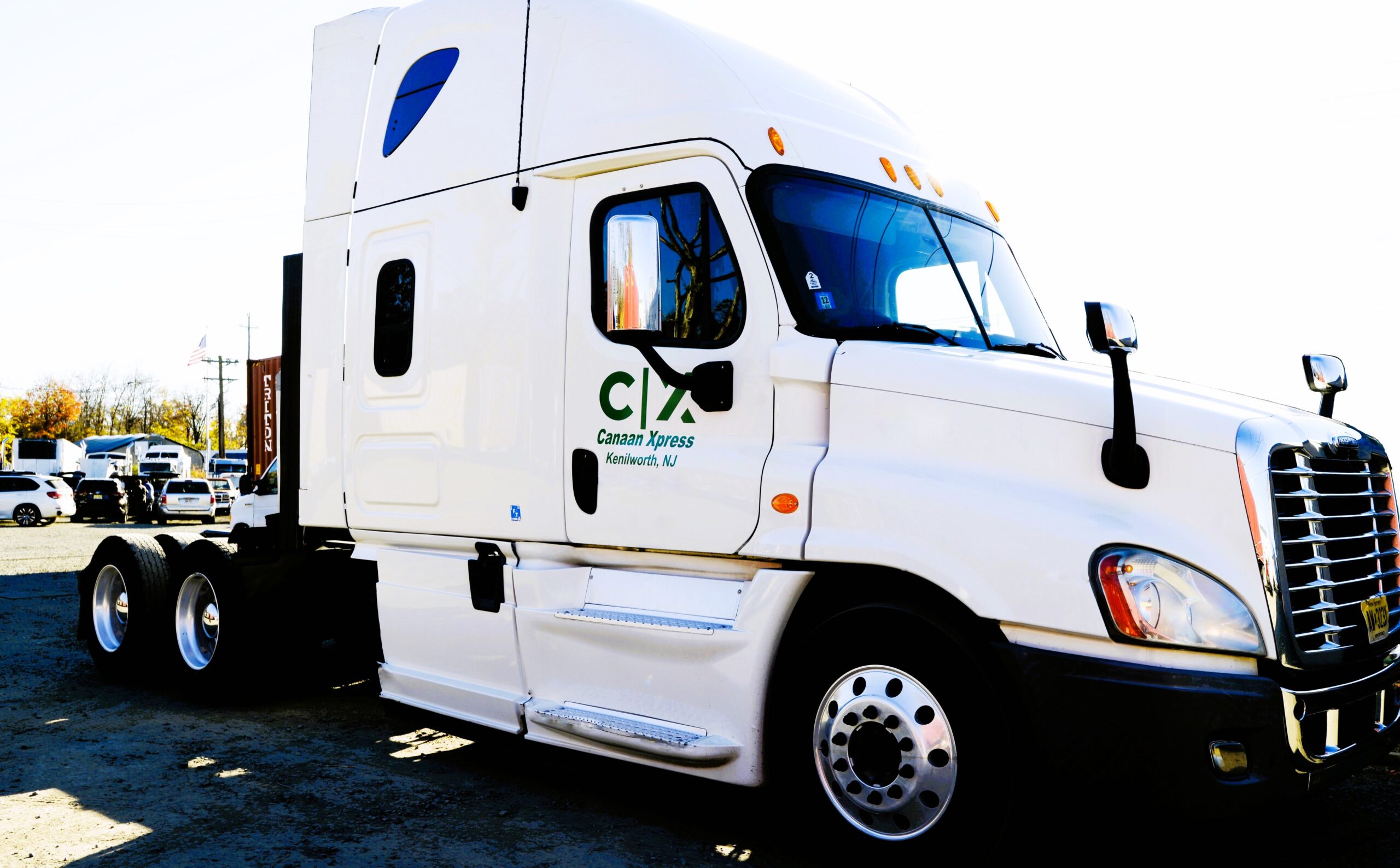 A white Canaan Xpress truck.